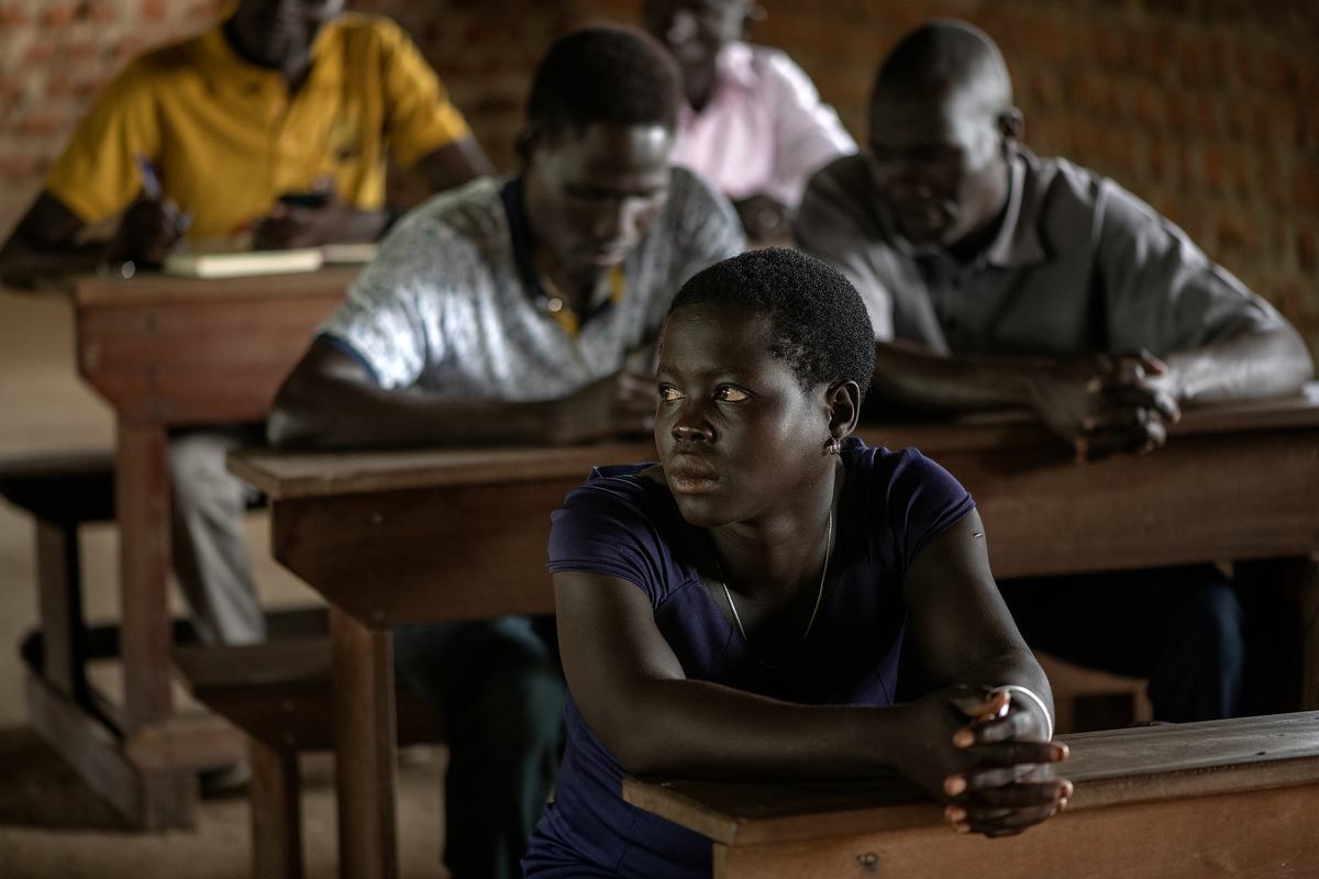 A NEATS student listening in class in Kajo Keji
