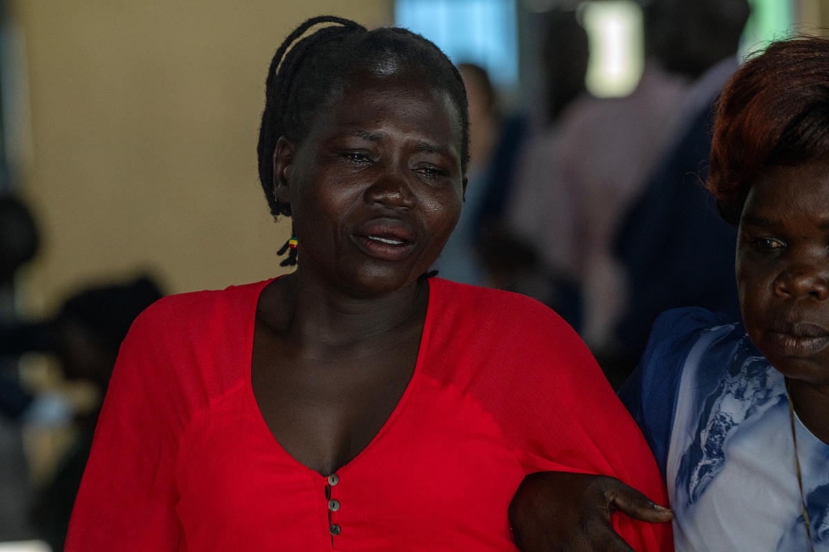 Woman with tears in church